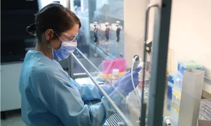  ?? Photograph: Alexandra Beier/Getty Images ?? A scientist works on a cure for Covid-19 at Eisbach Bio during the coronaviru­s pandemic in Planegg, Germany.