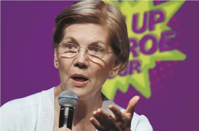  ?? HERALD PHOTO BY JIM MICHAUD ?? FIGHT FOR RIGHTS: Sen. Elizabeth Warren speaks during the ‘Rise Up for Roe’ tour yesterday in Boston.