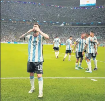  ?? AP ?? Argentina forward Lionel Messi celebrates after scoring the opening goal against Mexico at Lusail Stadium on Saturday.