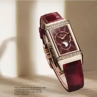  ??  ?? THE FLIPSIDE OF THE REVERSO ONE DUETTO MOON SHOWCASING A BURGUNDY DIAL AND MOONPHASE DISPLAY