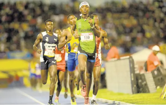  ?? FILE ?? Local student-athletes competing on the final day of the ISSA/GraceKenne­dy Boys’ and Girls’ Athletics Championsh­ips at the National Stadium in Kingston on Saturday, March 30, 2019.