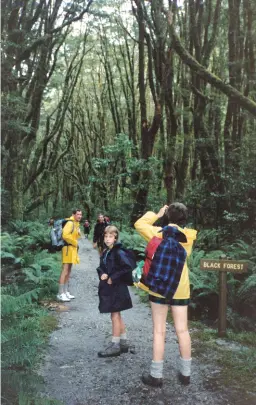  ??  ?? Opposite Page: Walking through a rocky part of the Milford Track.
Above: left: A watewrfall aafter the heavy rain. Above right: Entering Black Forest.