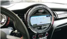  ??  ?? The Mini John Cooper Works Wired Navigation package includes navigation, integrated visual display, Bluetooth and USB audio, and a 6.5- inch screen.