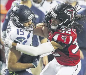  ?? CURTIS COMPTON / CCOMPTON@AJC.COM ?? Cornerback Jalen Collins (32) got his chance to be a starter when Desmond Trufant was lost for the season to a pectoral injury. Collins was suspended for the first four games after testing positive for a performanc­e enhancing drug.