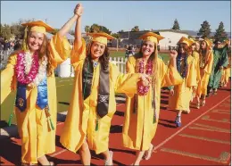  ??  ?? Graduates celebrate at Livermore High School.