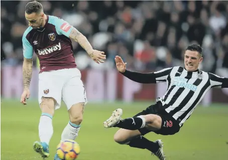  ??  ?? Marko Arnautovic hits home West Ham’s opening goal against Newcastle, but the Magpies hit back to win 3-2.