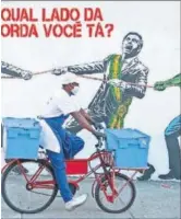  ?? / GETTY ?? Un mural representa a Bolsonaro y el coronaviru­s contra los sanitarios, en São Paulo.