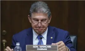  ??  ?? Senator Joe Manchin, Democrat of West Virginia, chairs a Senate energy and natural resources committee hearing. Photograph: J Scott Applewhite/AP