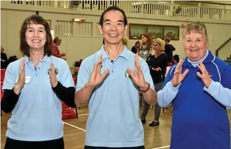  ??  ?? HEALTH BENEFITS: Tai Chi instructor Dr Paul Lam (centre) teachers Hazel Thompson (left) and Rosalie Ruddock.
PHOTO: BEV LACEY