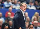  ?? Jessica Hill / Associated Press ?? Getting back in the gym with the Huskies has helped return a small sense of normalcy for UConn women’s basketball coach Geno Auriemma.