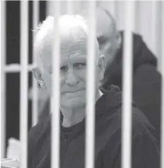  ?? AGENCE FRANCE PRESSE ?? In this file photo taken on January 05, 2023 Nobel Prize winner Ales Bialiatski is seen in the defendants’ cage in the courtroom at the start of the hearing in Minsk.