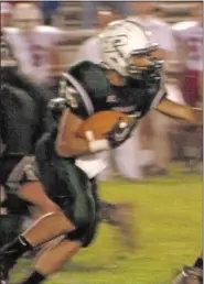  ?? For Montgomery Media / SUSAN KEEN ?? Pennridge’s Mike Class carries the ball during Friday night’s action against Souderton.