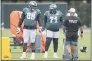  ?? POOL PHOTO - TIM TAI/THE INQUIRER ?? Jordan Mailata, left, talks to Jason Peters during a drill at Eagles practice Tuesday at the NovaCare Complex.