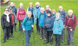  ??  ?? Walk leader Carolyn Jenkins with participan­ts.