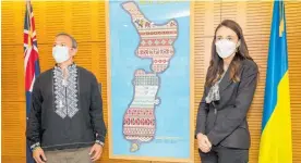  ?? Photo / Mark Mitchell ?? Andriy Legenkyy and Prime Minister Jacinda Ardern after the unveiling of the artwork at Parliament.