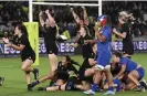  ?? Photograph: Andrew Cornaga/AP ?? New Zealand celebrate after defeating France in the second of two thrilling semifinals.