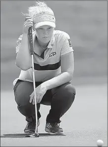  ?? AP/The Canadian Press/FRANK GUNN ?? Canadian Brooke Henderson bogeyed the final two holes, but still managed to hold a two-stroke lead over three others after two rounds of the Meijer LPGA Classic at Grand Rapids, Mich., on Friday.