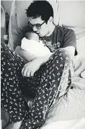  ?? FACEBOOK ?? Brandon Calahoo holds his girlfriend’s infant daughter Raelyn Supernant.