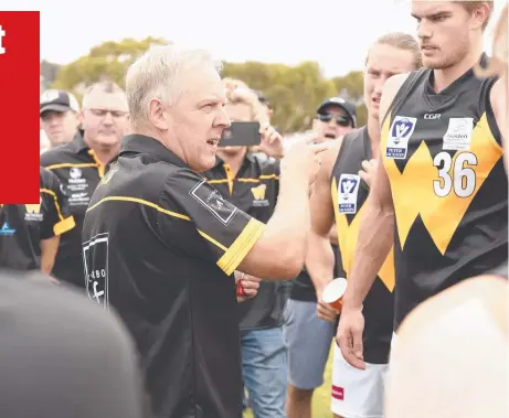  ??  ?? Werribee coach John Lamont speaks with his troops at quarter-time at Spring Creek Reserve yesterday. Picture: ALAN BARBER