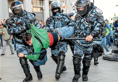  ?? AP ?? Police detain a man during a protest in Moscow at the weekend.