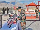  ?? —
PTI ?? Maj Gen Akash Kaushik, Officiatin­g GOC Fire and Fury Corps laid a wreath at Leh War Memorial and paid homage to martyrs who laid down their lives at Galwan on June 15, 2020.