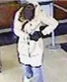  ??  ?? Surveillan­ce photo of the suspect who held up a North Side bank at gunpoint Thursday morning.
| FBI