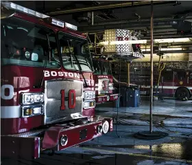  ??  ?? At the base of
this historic brass pole is a crucial addition:
padding to cushion a firefighte­r’s landing.