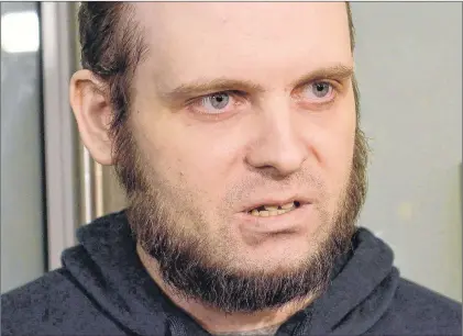  ?? CP PHOTO ?? Freed hostage Joshua Boyle speaks to members of the media at Toronto’s Pearson Internatio­nal Airport Oct. 13, 2017. Boyle faces charges including sexual assault, assault and forcible confinemen­t.