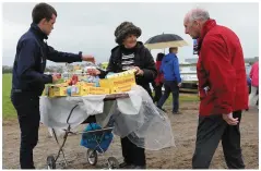  ?? Photo By Domnick Walsh ?? Sweet sellers with their mobile stalls at the Listowel Races.