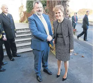  ?? Picture: Press Associatio­n. ?? Irish Senator Denis O’Donovan greets First Minister of Scotland Nicola Sturgeon at Leinster House, Dublin.