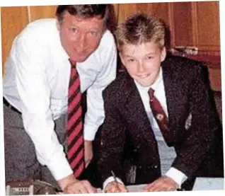  ??  ?? One for the future: Sir Alex with David Beckham at the age of 14