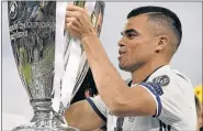  ?? Picture: AFP ?? UNIMPRESSE­D: Real Madrid defender Pepe, seen lifting the Uefa Champions League trophy, will be leaving the club