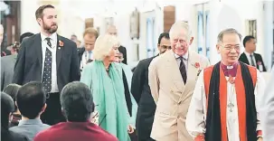  ?? — Gambar Bernama ?? TIBA: Putera Charles dan Camilla mengadakan lawatan ke St Mary Cathedral di Kuala Lumpur, semalam. Turut sama Hing (kanan).