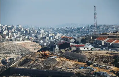  ?? (Ronen Zvulun/Reuters) ?? A CONSTRUCTI­ON SITE in Efrat in the Gush
Etzion settlement block.