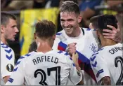  ??  ?? Kyle Lafferty celebrates his late strike