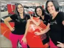  ?? PHOTOGRAPH: BRIAN WITBOOI ?? SLEEK LINES: Petrol Head Paradise Moto Show 2013 visitors (from left) Maryka Hendricks, Charne Blume and Monique Nutt admire a Lamborghin­i at the show yesterday. The show ends on Monday