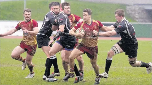  ?? Picture: STEVE LEWIS ?? RGC scrum-half Alex Schwarz aims to break through the Bedwas defence during last Saturday’s Premiershi­p clash at Parc Eirias.