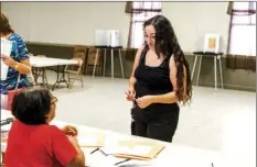  ?? VINCENT OSUNA PHOTO ?? Holtville resident Ruby Enriquez registers to vote during the 2018 Primary Election on Tuesday at Holtville United Methodist Church in Holtville.