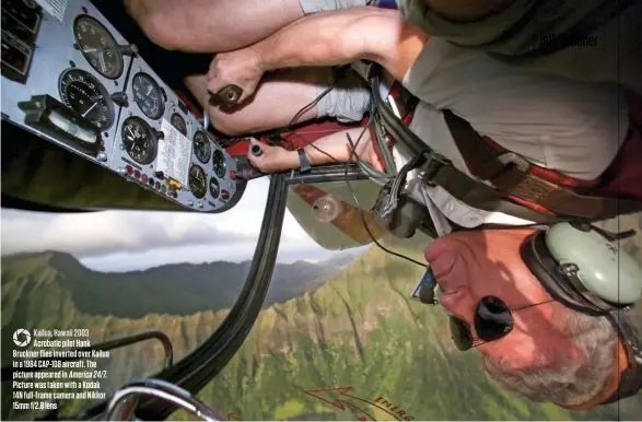  ??  ?? Kailua, Hawaii 2003 Acrobatic pilot Hank Bruckner flies inverted over Kailua in a 1984 CAP-108 aircraft. The picture appeared in America24/7. Picture was taken with a Kodak 14N full-frame camera and Nikkor 15mm f/2.8 lens