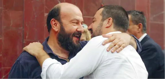  ??  ?? L’abbraccioI­l poeta Davide Rondoni, 54 anni, e il leader della Lega Matteo Salvini, 45 anni, insieme ieri a Milano al Piccolo festival dell’essenziale. La kermesse è giunta alla sesta edizione — è stata ideata da Rondoni — e quest’anno si è tenuta al Centro culturale Rosetum(Lapresse)