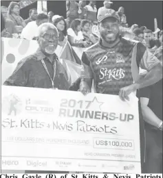  ??  ?? Chris Gayle (R) of St Kitts &amp; Nevis Patriots receives the runners-up cheque from Most Hon. PJ Patterson (L) of CPL after the Finals of the 2017 Hero Caribbean Premier League between Trinbago Knight Riders and St Kitts &amp; Nevis Patriots at Brian Lara Cricket Academy in Tarouba, Trinidad. (Photo by Randy Brooks CPL T20 via Getty Images)