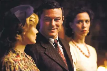  ?? ANNAPURNA PICTURES ?? Rebecca Hall, left, Luke Evans and Bella Heathcote star in “Professor Marston and the Wonder Women,” about the life and loves of the creator of the Wonder Woman character.