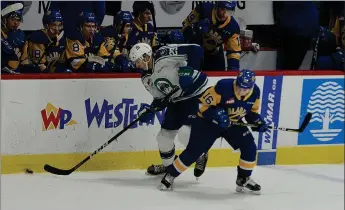  ?? STEVEN MAH/SOUTHWEST BOOSTER FILE PHOTO ?? Swift Current Broncos forward Cole Nagy (left) had a hat trick during a 4-2 win over the Moose Jaw Warriors on Sunday.