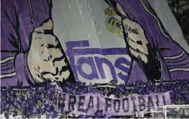  ??  ?? Real Madrid fans unveil a banner before their Champions League game against Manchester City last year. Photograph: Anadolu Agency/Anadolu Agency via Getty Images