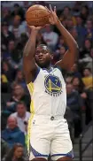  ?? MATTHEW STOCKMAN — GETTY IMAGES ?? Eric Paschall had 22 points, five rebounds and five assists in Tuesday night’s 116-100victory on the road against Denver.