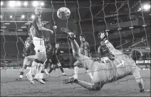  ?? REUTERS ?? Phil Foden (center) watches his deflected strike find the net for Manchester City’s first goal in a 3-1 English Premier League victory over Everton at Goodison Park on Wednesday.