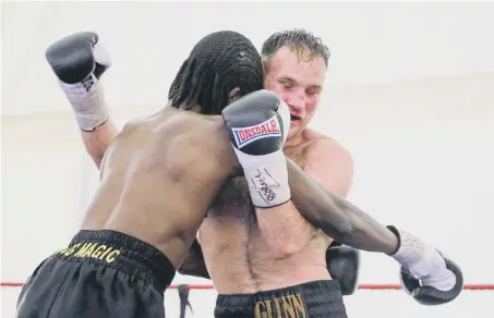  ??  ?? Glenn Foot in action in his defeat to Akeem Brown in the defence of his English light-welterweig­ht title.