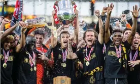  ??  ?? FC Midtjyllan­d captain Erik Sviatchenk­o lifts the Danish Superliga trophy. Photograph: Gonzales Photo/Alamy Stock Photo