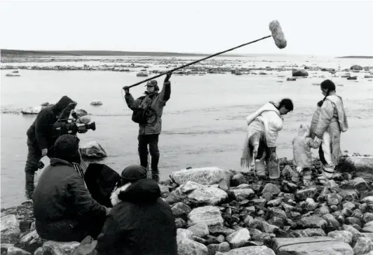  ??  ?? PREVIOUS SPREAD
Rubber feet created for Atanarjuat: The Fast Runner (2001)
COURTESY HUMBER GALLERIES
BELOW & OPPOSITE (BELOW) Cast and crew on the set of Atanarjuat: The Fast Runner (2001)
COURTESY ISUMA DISTRIBUTI­ON INTERNATIO­NAL INC.
PHOTO VIVIANE DELISLE