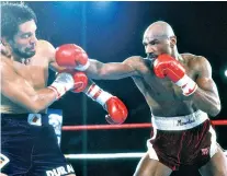  ??  ?? Golden era: Marvin Hagler (right) takes on Roberto Duran in one of the ‘Four Kings’ rivalries that defined the Eighties middleweig­ht scene